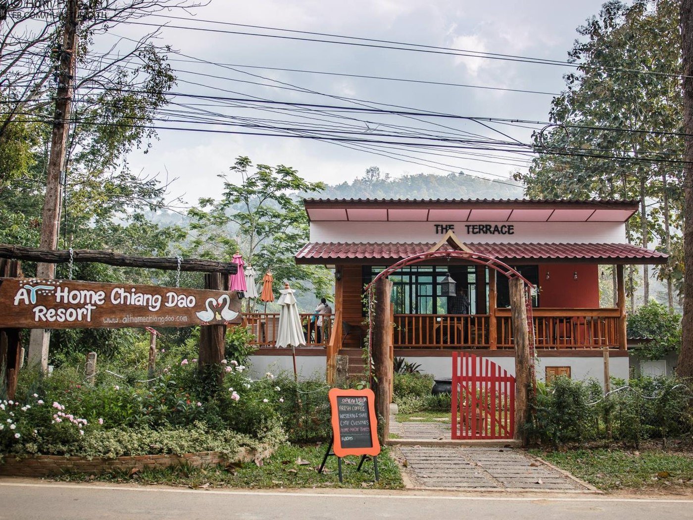 Entrance and roadside building at At Home Chiang Dao Resort