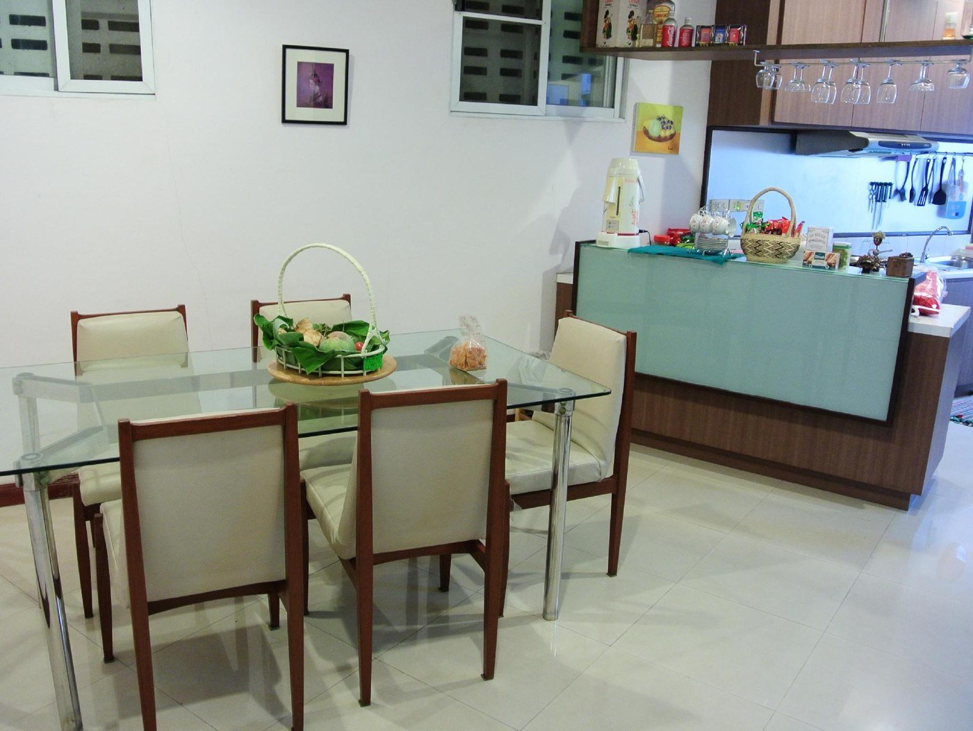 Shared kitchen and dining area at Baan Manusarn