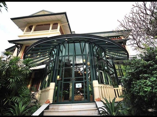 Chakrabongse Villas building and glass-fronted pavilion