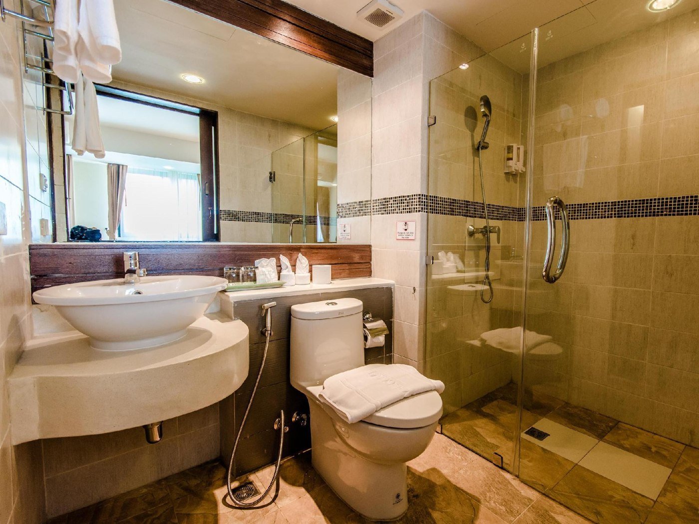 Walk-in shower, toilet and basin in a Golden Bell bathroom