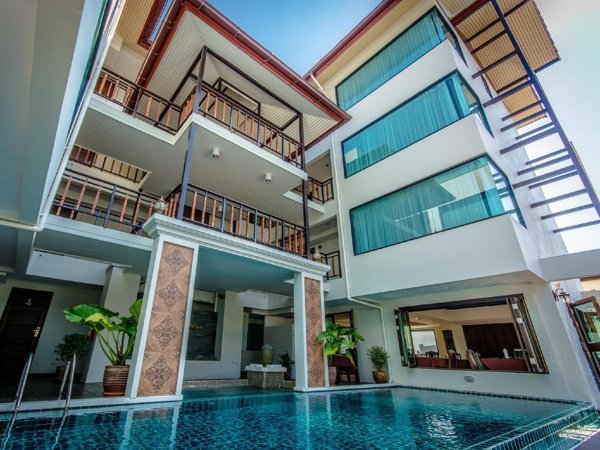 Golden Bell Hotel buildings surrounding the courtyard swimming pool