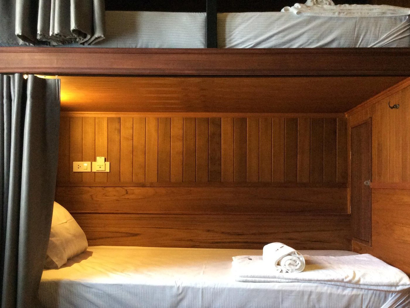 Wooden sleeping pod at Hogwortz Hostel
