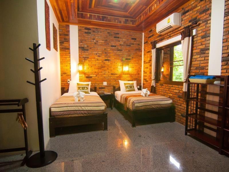 Twin-bed room at Hotel Khao Sok and Spa