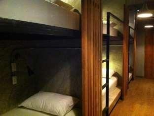Wooden bunks at In a Box Hostel