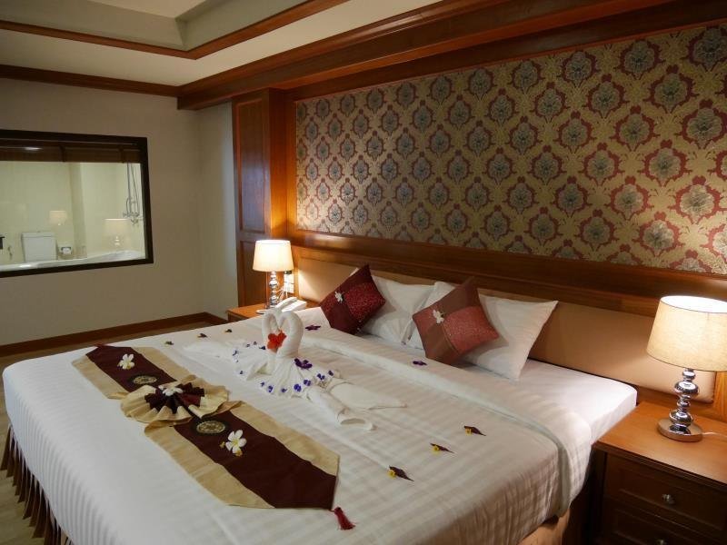 Guest bedroom at The Sunset Beach Resort Kho Khao Island