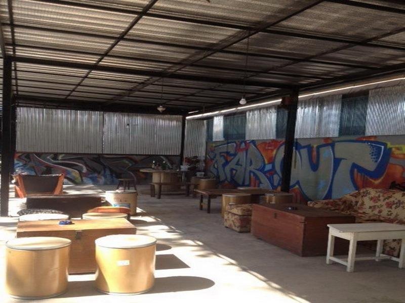 Covered communal seating and mural at Viva Shack